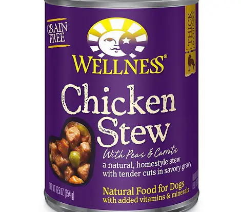 a purple can of Wellness Thick and Chunky wet dog food